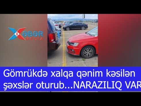 Gömrükdə xalqa qənim kəsilən şəxslər oturub...